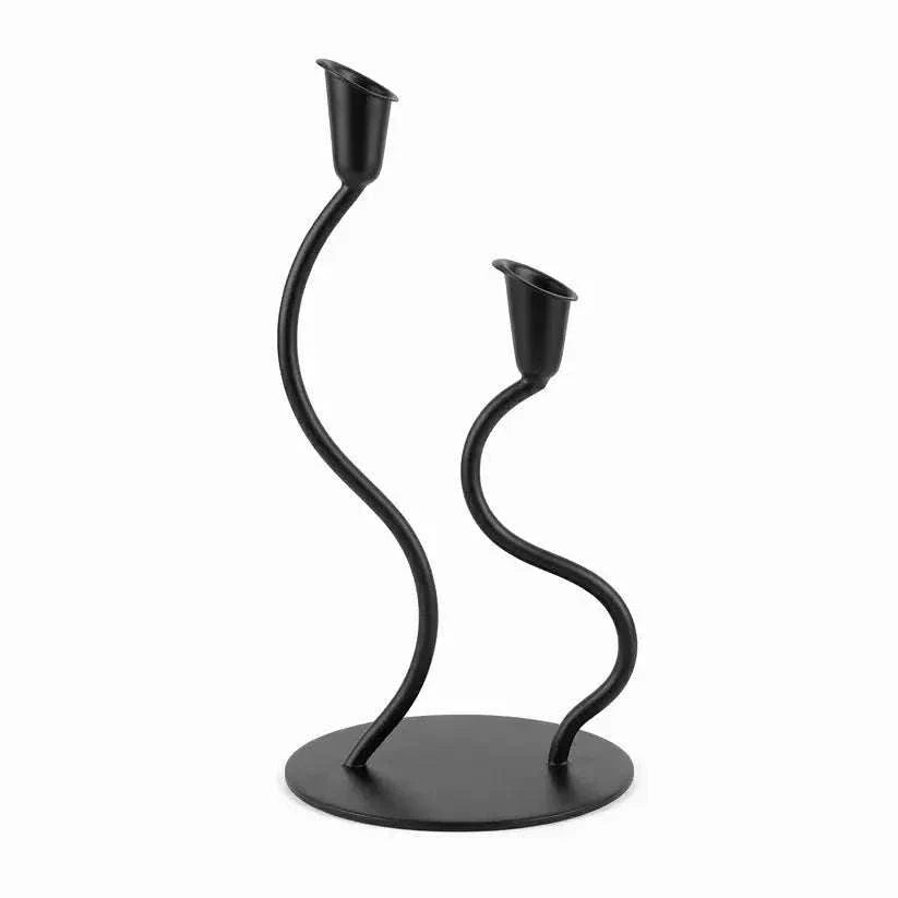 Black tealight two candle holders with sleek black finish creating cozy ambiance for modern decor