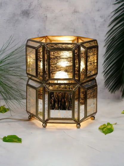 Decorative table lamp with geometric design on a light background