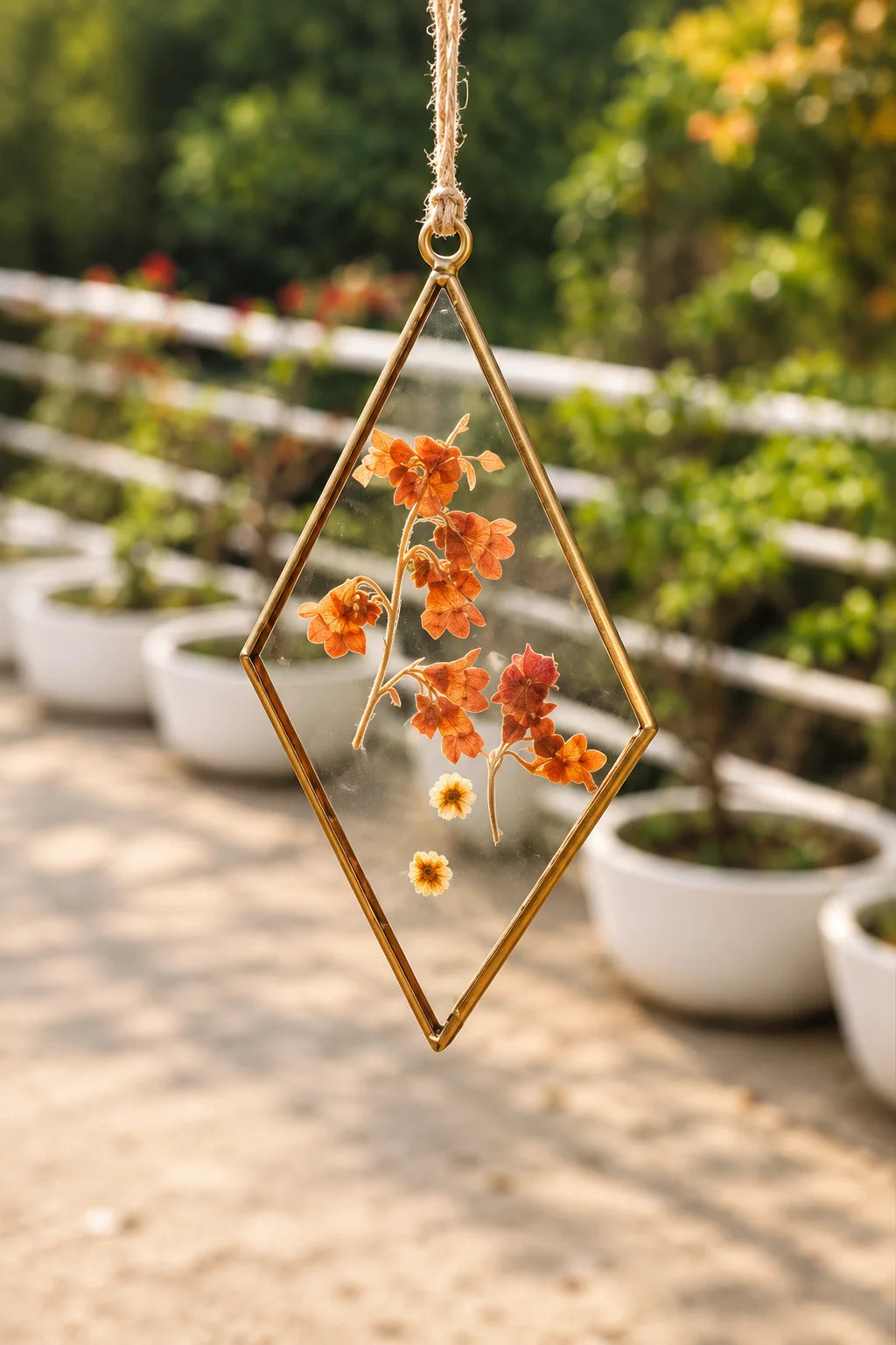 Artisan Glass Suncatcher Pendant with delicate pressed flowers and a handcrafted frame for elegant natural home décor – ILLUMEA
