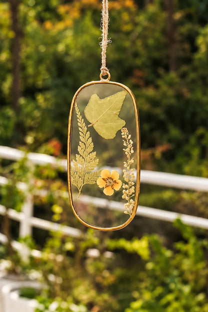 Dried Flower Suncatcher Pendant with preserved botanical flowers inside a clear glass frame for natural home décor – ILLUMEA