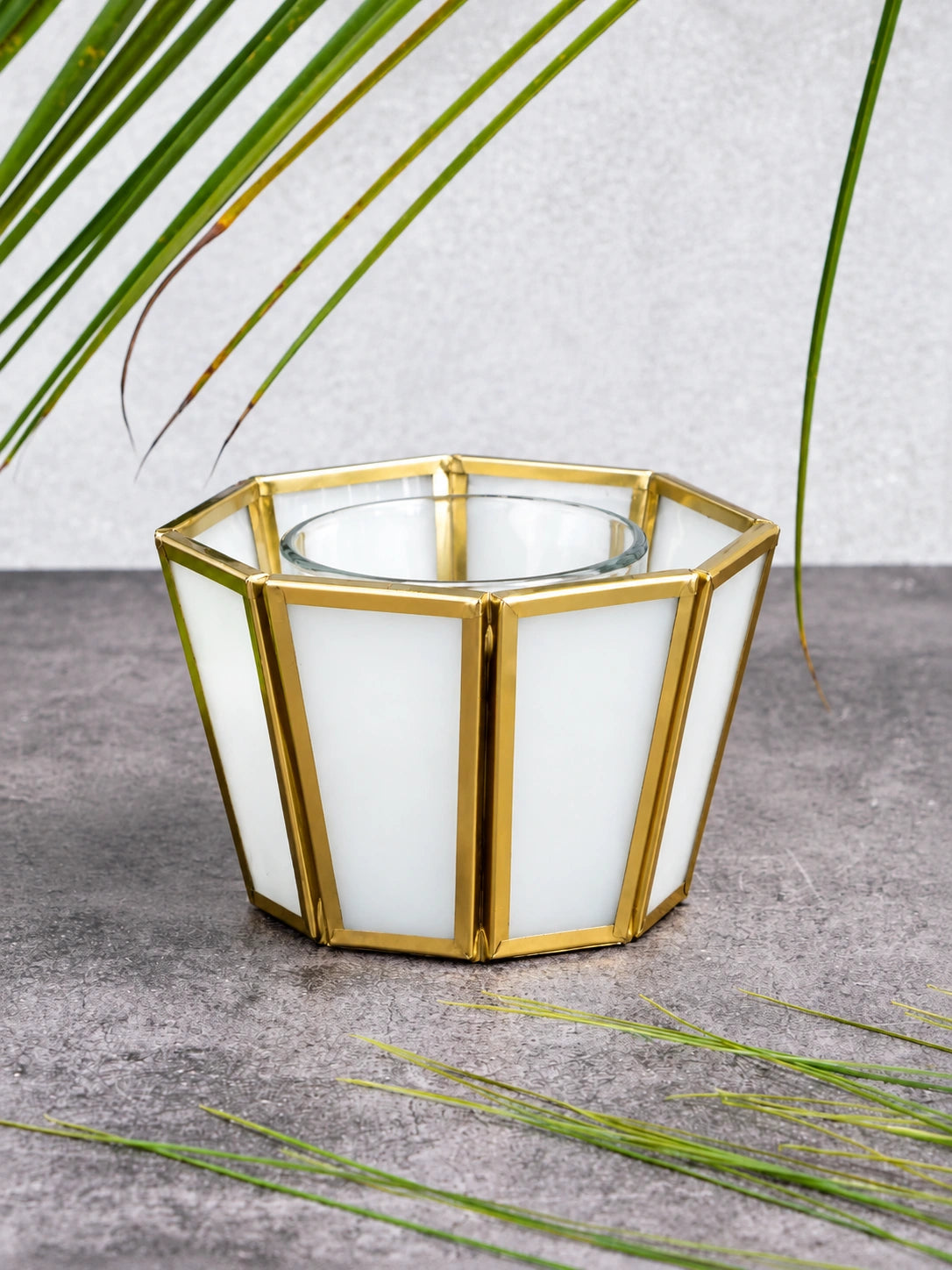 Luxury Geometric White Glass Tealight Holder – ILLUMEA decorative candle lantern designed with diamond-inspired geometric brass framing and translucent white natural glass panels