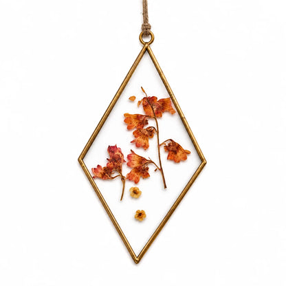 Handmade Botanical Glass Suncatcher Pendant featuring preserved flowers and artistic detailing for windows and interior spaces – ILLUMEA