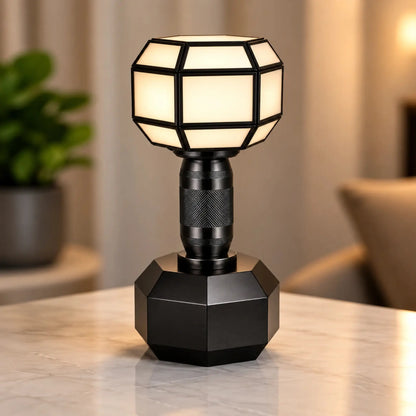 ILLUMEA Dumble Shade Table Lamp with a geometric black metal frame and frosted diffuser for modern home interiors