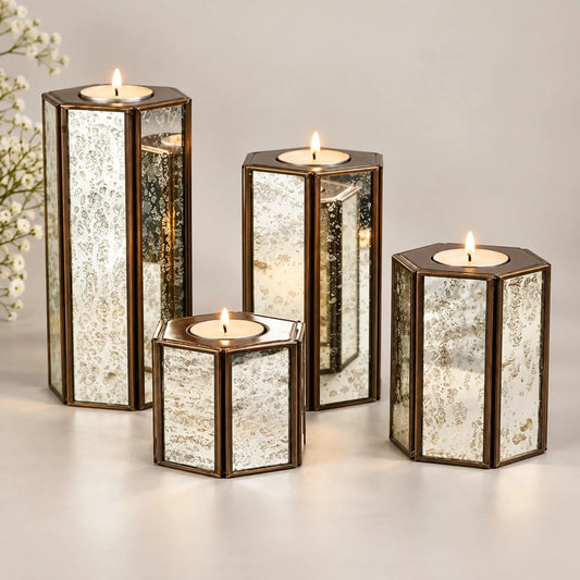 Hexa Candle Holder Set of 4 with Silver Antique Glass – ILLUMEA, featuring elegant hexagonal frames and distressed mirrored glass for luxury home décor.