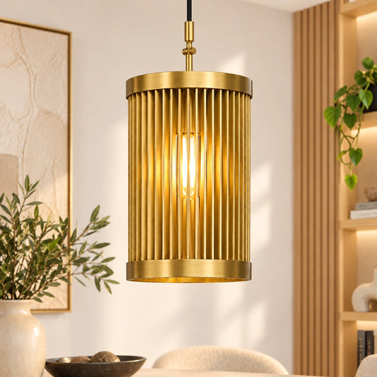 Luxury Iron Strips Gold Pendant Light by ILLUMEA featuring a modern cylindrical design with vertical metal strips and warm illumination for elegant home interiors