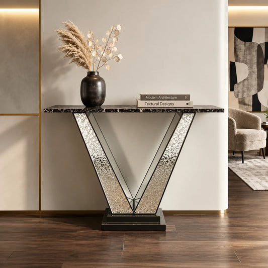 Luxury Brass Console Table with geometric V-shaped base, elegant metallic detailing and a dark marble top for sophisticated interiors – ILLUMEA
