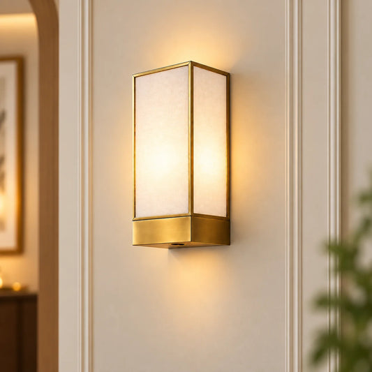Rectangular Glass Wall Lamp with brass finish and warm illumination for elegant modern interiors – ILLUMEA