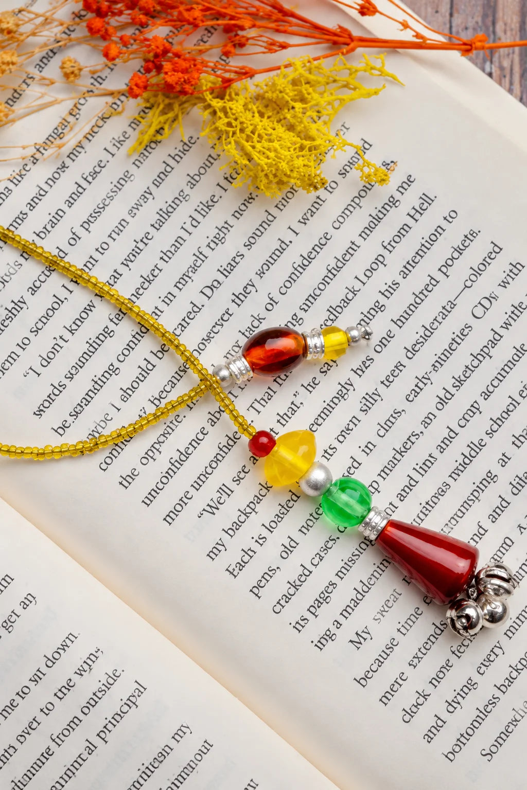 Elegant yellow glass beads bookmark showcasing vibrant hues and luxurious craftsmanship for stylish reading enthusiasts