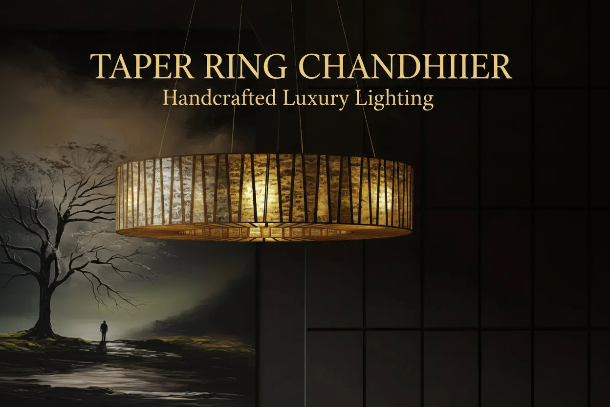 Dining room with a modern chandelier, round table, and chairs.